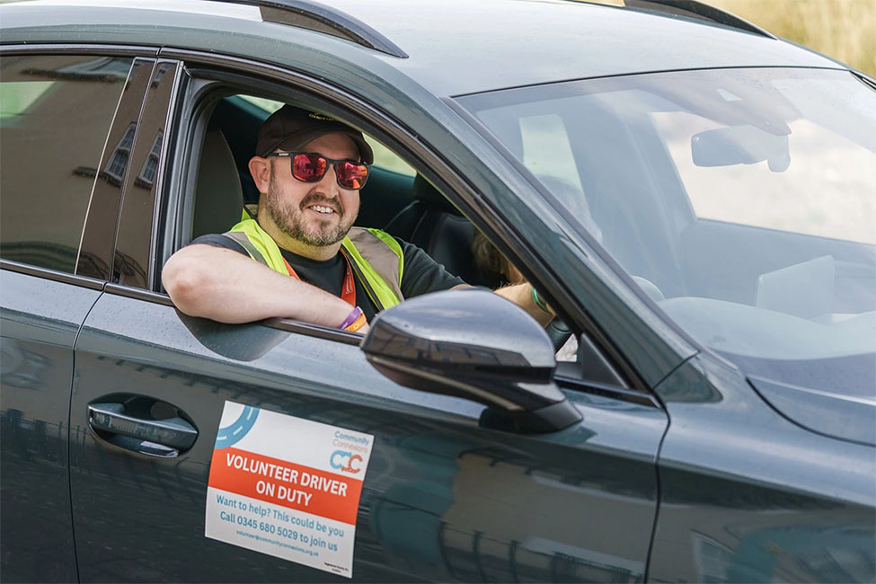 Community Connexions volunteer driver providing assistance for elderly and disabled people