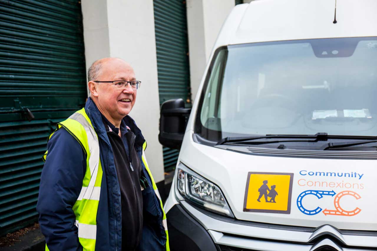 Community Connexions driver, Terry, in front of minibus